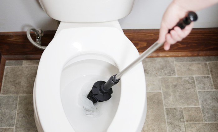 Toilet clogged filled with water